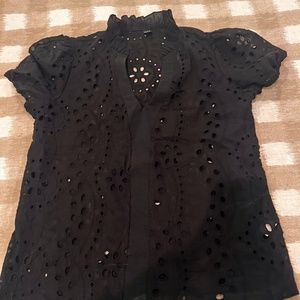 Black eyelet top with ruffle neck and sleeve M